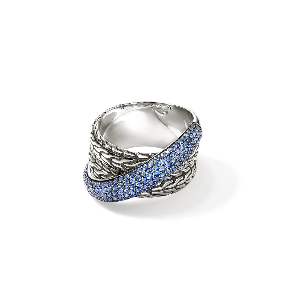 Essentials sterling silver 12.5 mm crossover ring with blue sapphires
