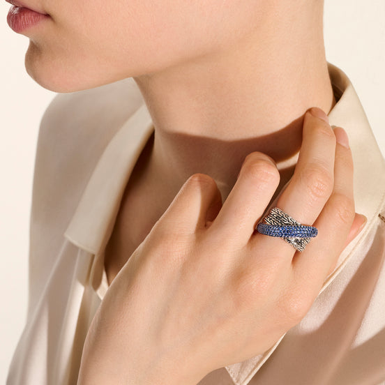 Essentials sterling silver 12.5 mm crossover ring with blue sapphires